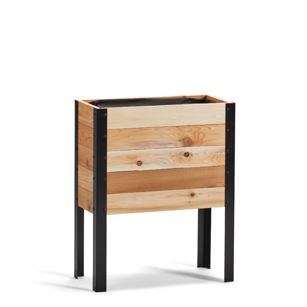 Wooden planter box with black metal legs on a white background
